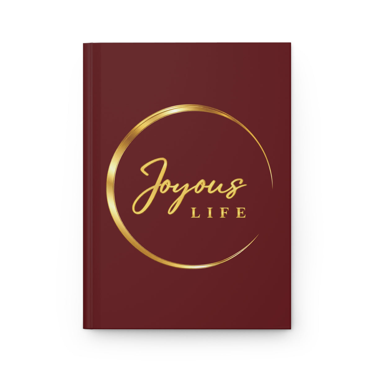 Joyous Life Signature hardcover journal with a burgundy cover and gold-look circular Joyous Life logo.
